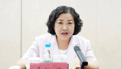 屈玲妮，被查